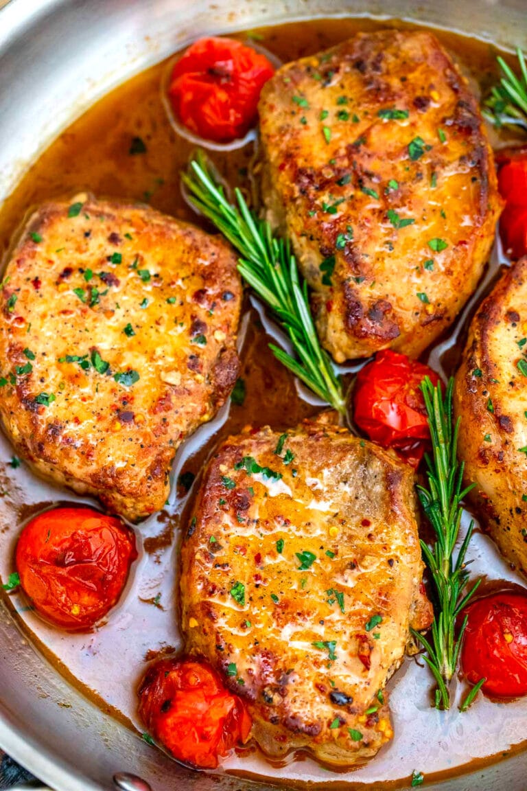 Image of skillet pork chops in sauce.