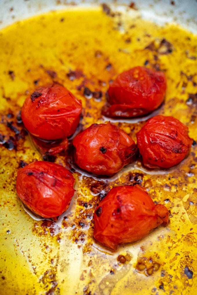 searing grape tomatoes.
