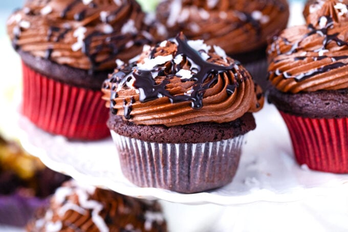 German chocolate cupcakes on a cake stand.