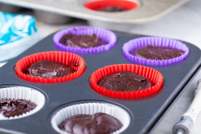 German chocolate cupcakes in muffin tin before baking.