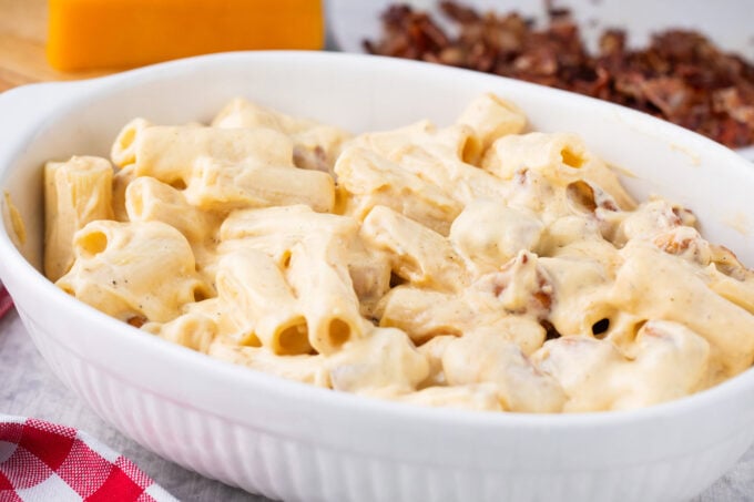 Bacon ranch and cheese chicken baked ziti pasta in a baking dish.