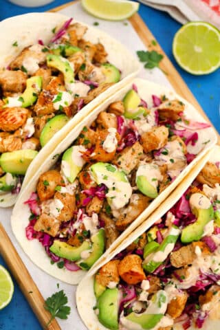 Photo of chipotle chicken tacos with chipotle cream.