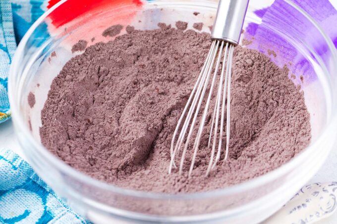 Mixing dry ingredients in a bowl.