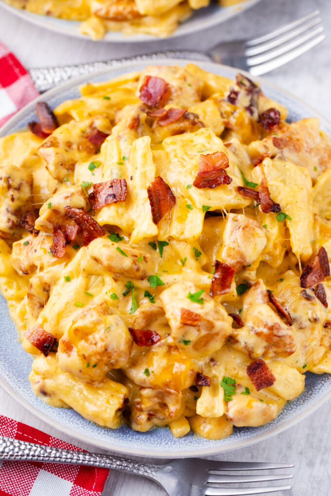 Homemade bacon ranch and cheese chicken baked ziti topped with crispy bacon pieces.