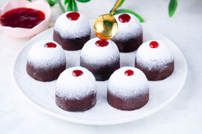 Instant pot chocolate muffins on a serving plate.