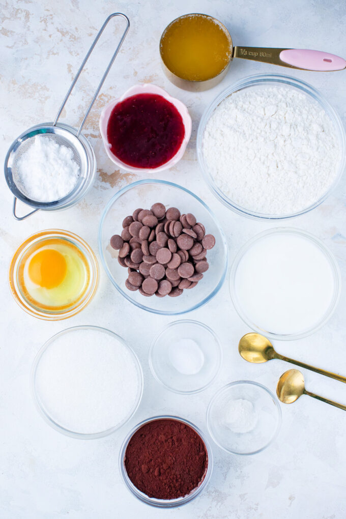 Overhead shot of instant pot chocolate muffins ingredients in bowls on a serving plate.