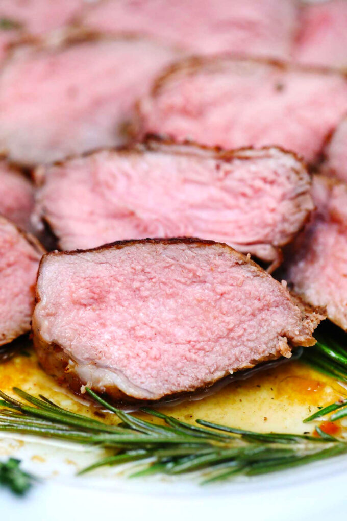 Image of sliced medium cooked steak.