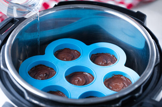 Instant pot chocolate muffins batter in a silicone pan.