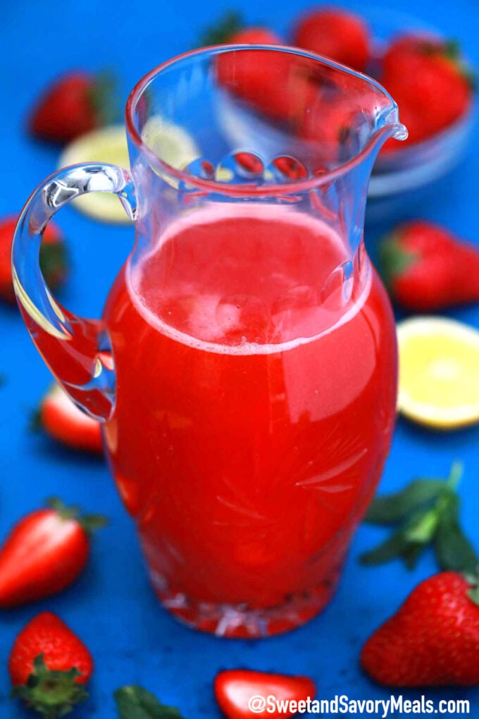 Photo of a pitcher with strawberry lemonade.