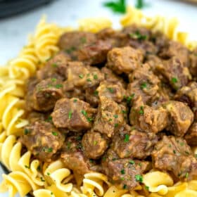 Picture of beef tips and gravy over noodles.