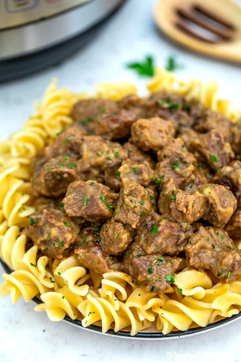 Picture of beef tips and gravy over noodles.