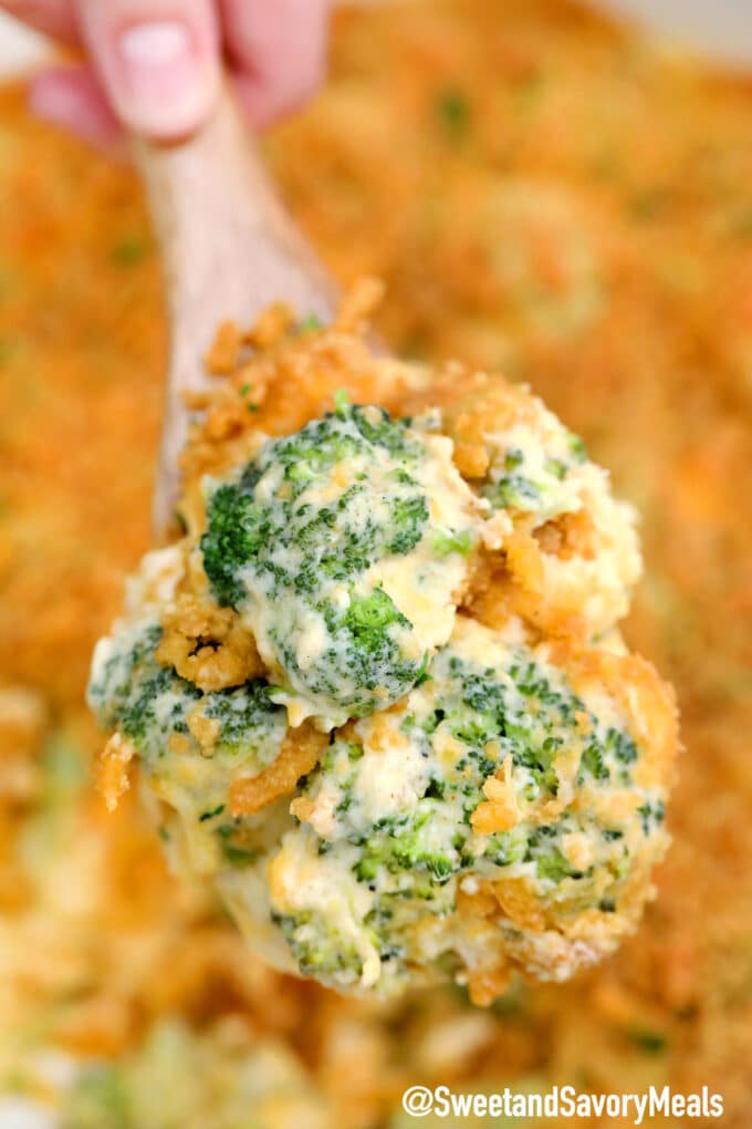 Spoonful of cheesy broccoli casserole.