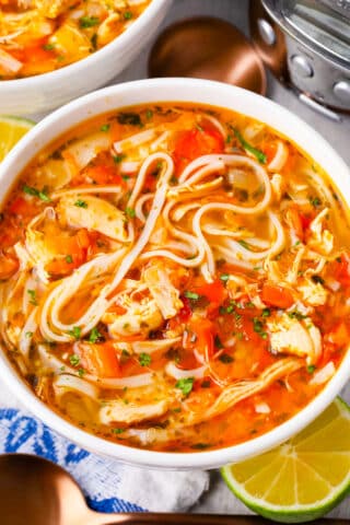 Overhead shot of slow cooker Asian chicken noodle soup.