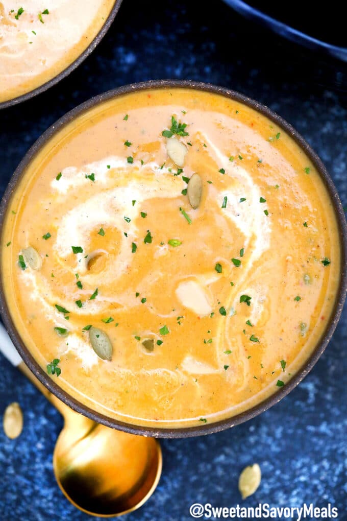 Crockpot soup made with pumpkin puree and heavy cream in a bowl