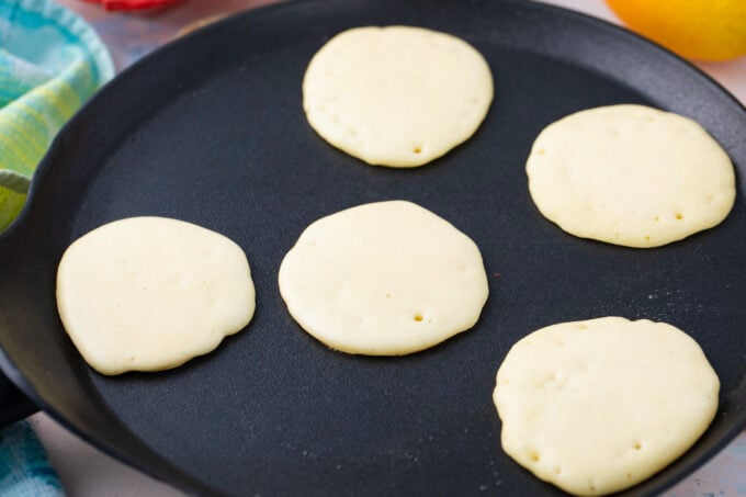 Cooking mini pancakes.