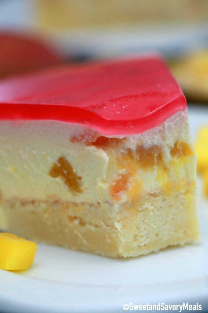 Homemade mango mousse cake with mango chunks.