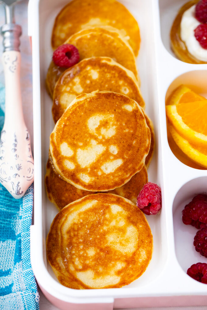 Silver dollars mini pancakes in a lunch box.