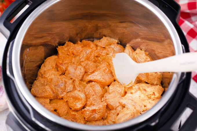 Searing Instant Pot chicken tikka masala.