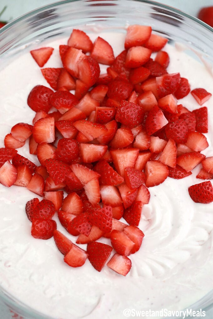 Photo of fresh strawberries and whipped cream cheese.