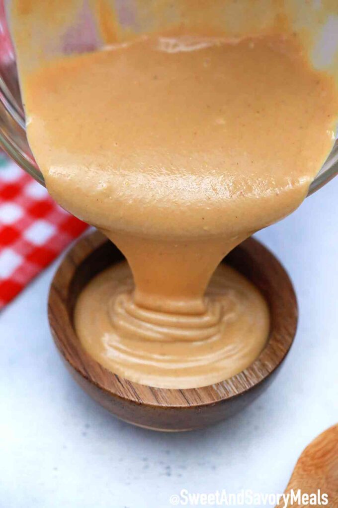 Pouring Chick-fil-A Sauce.