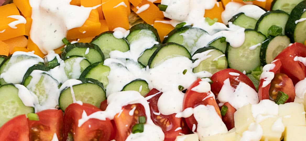 Image of chef salad with blue cheese dressing.