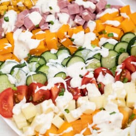 Image of chef salad with blue cheese dressing.