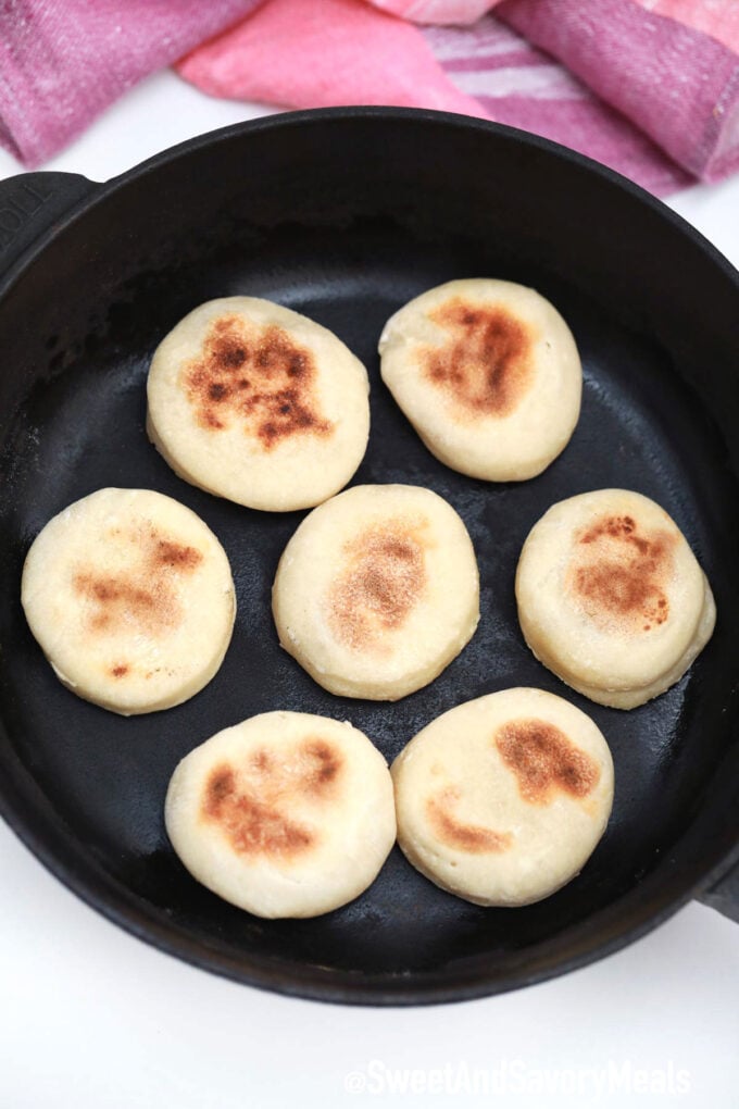 Cooking English Muffins in a cast iron skillet.