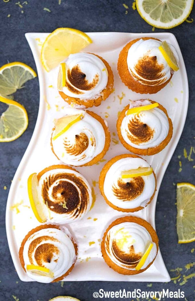 Lemon meringue cupcakes with lemons.