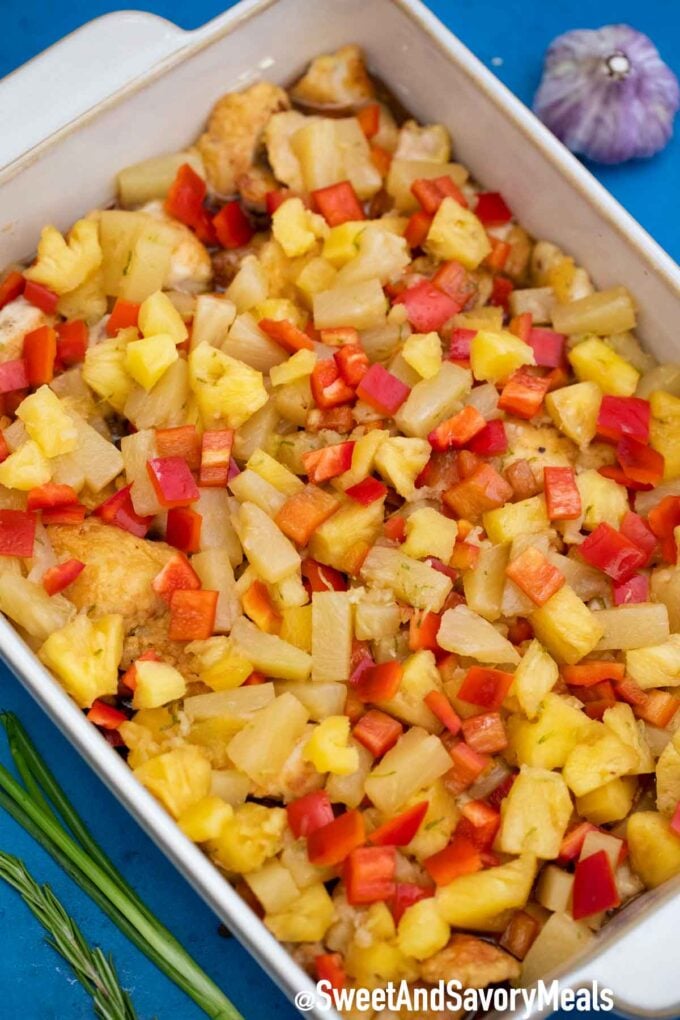 Hawaiian Chicken with pineapple and bell peppers in a casserole dish