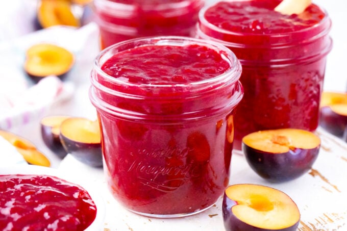 Jars with homemade plum jam.