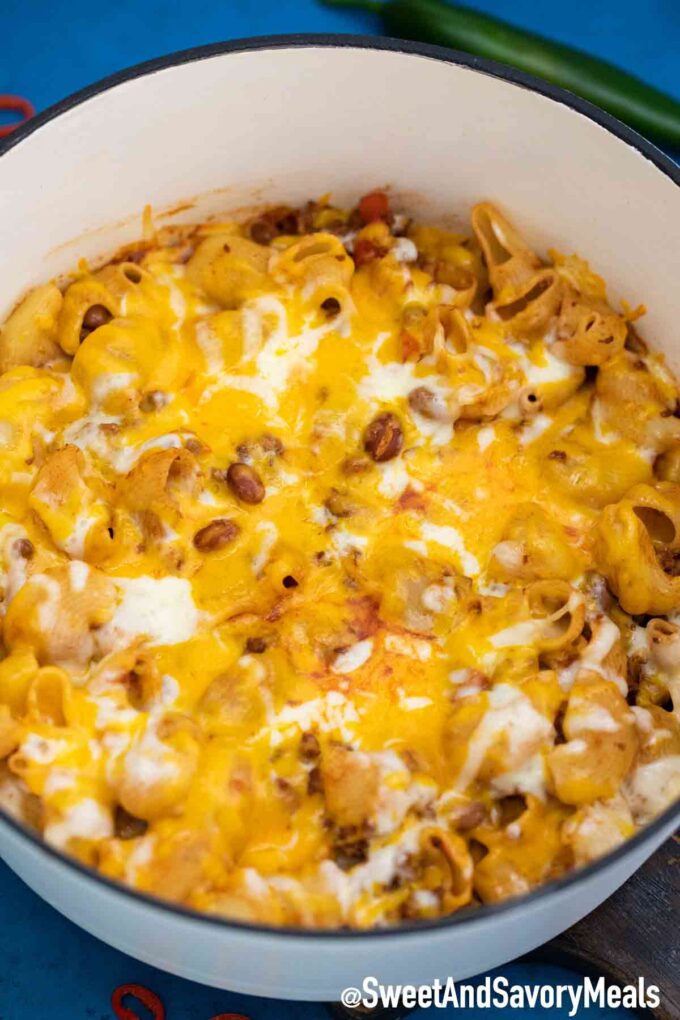 Cheesy Chili Mac in a white dutch oven.