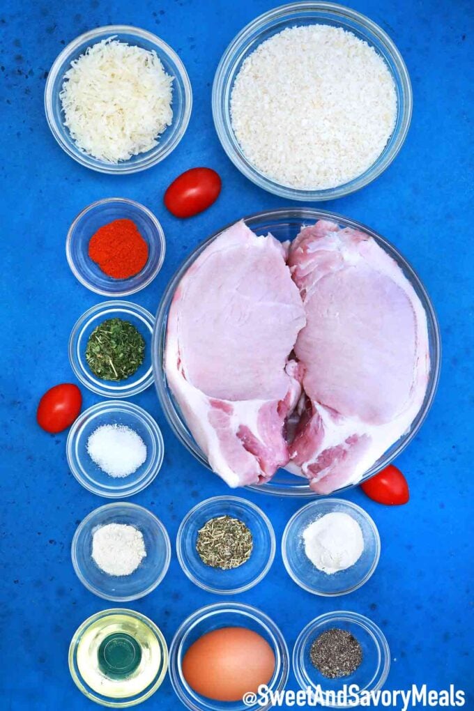 Crispy baked pork chops ingredients in bowls on a table