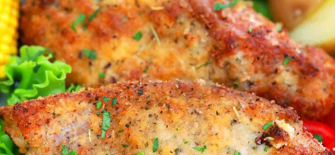 Crispy Pork Chops with greens and corn.