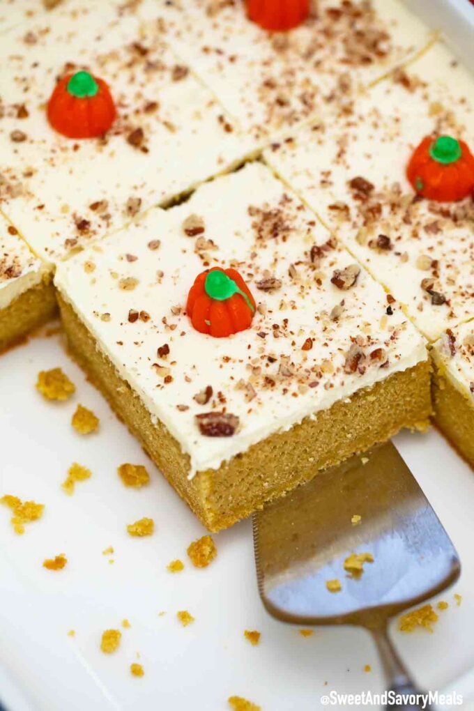 Pumpkin sheet cake square topped with pumpkin candy.
