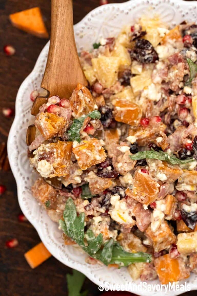 mixed sweet potato salad in a white bowl