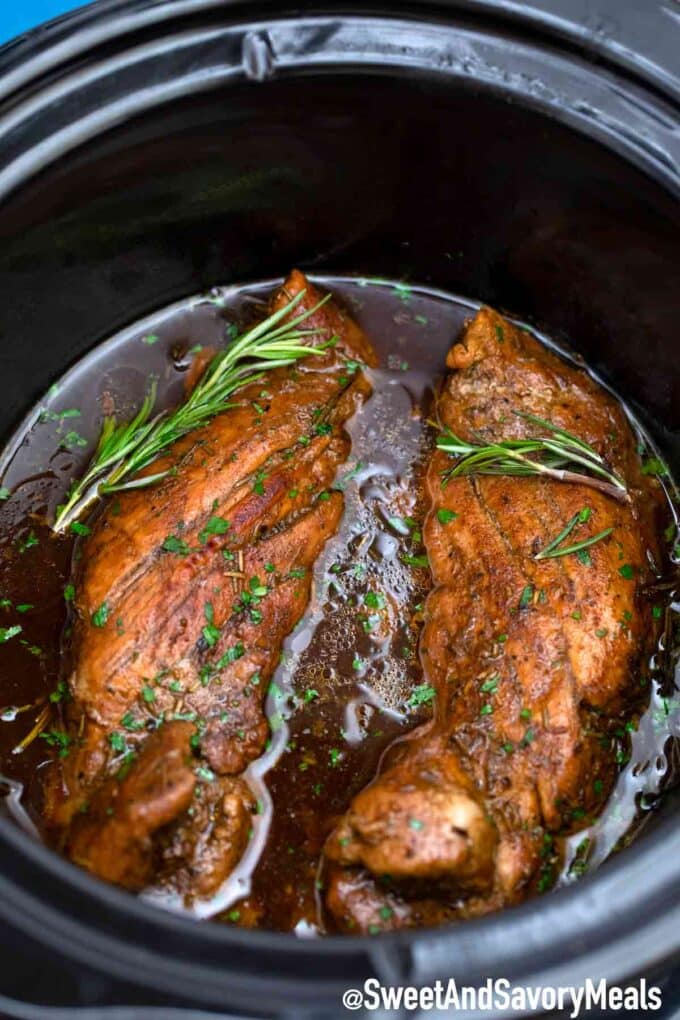 pork tenderloin cooked in the slow cooker with fresh rosemary 