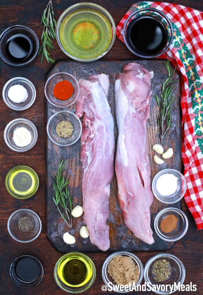 crock pot pork tenderloin ingredients in bowls on a wooden surface