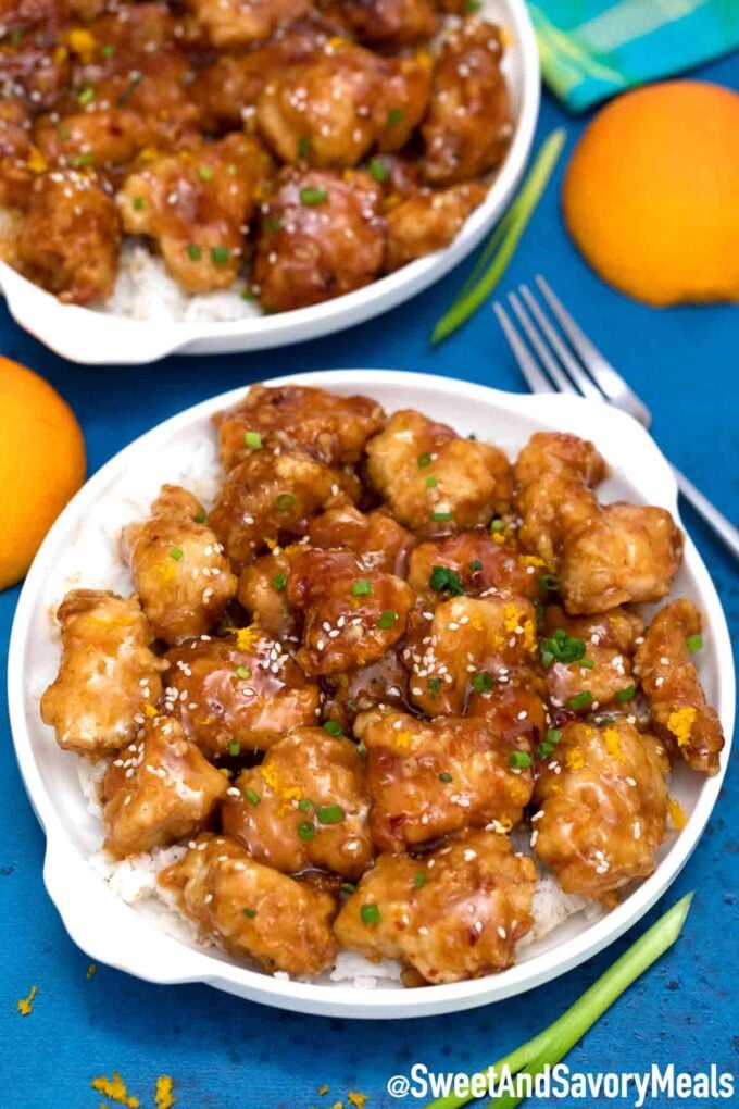 Panda Express orange chicken copycat with rice with oranges next to it