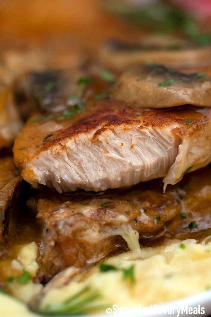 sliced tender pork chops that have been cooked in the instant pot