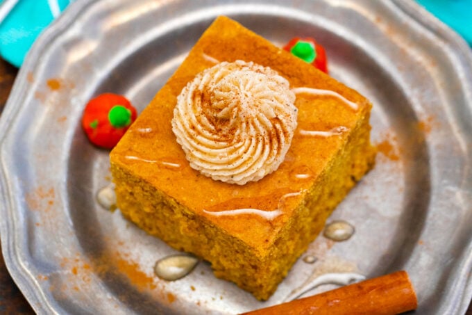 A slice of pumpkin cornbread with cinnamon honey butter.