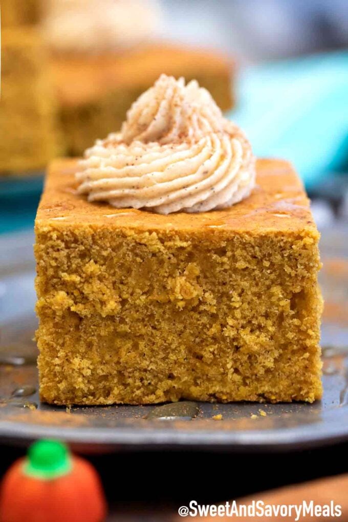 cornbread with pumpkin and topped with honey on a silver plate