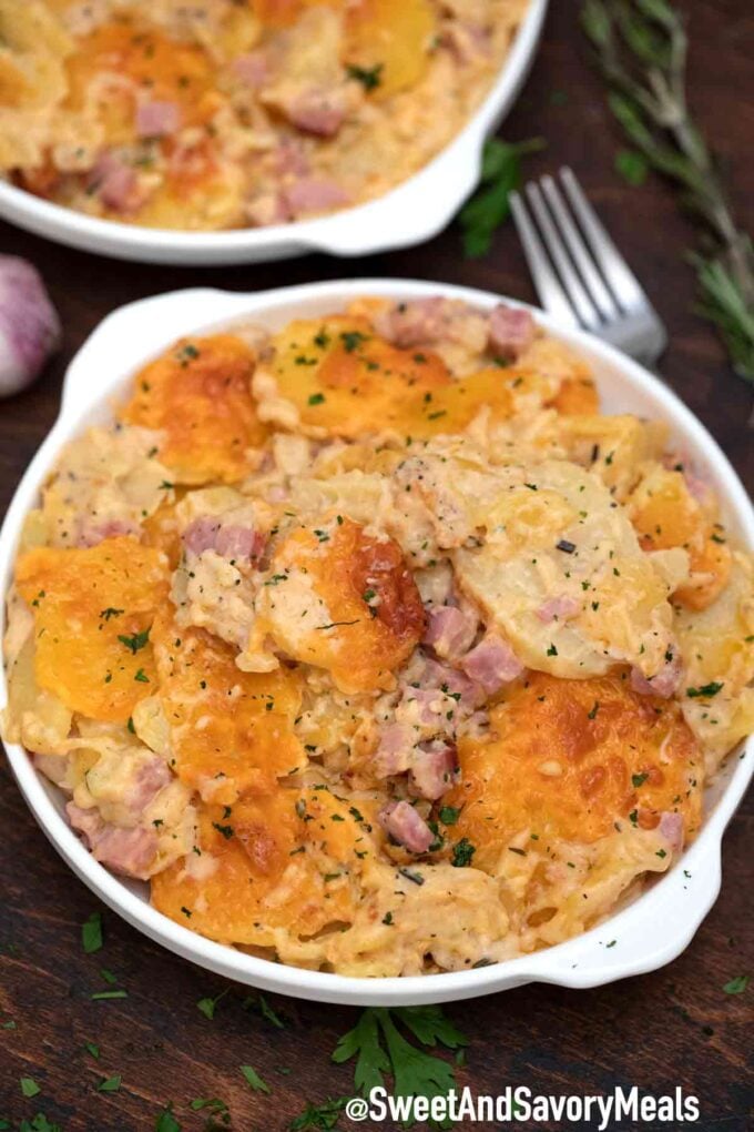 scalloped potatoes and ham on a plate