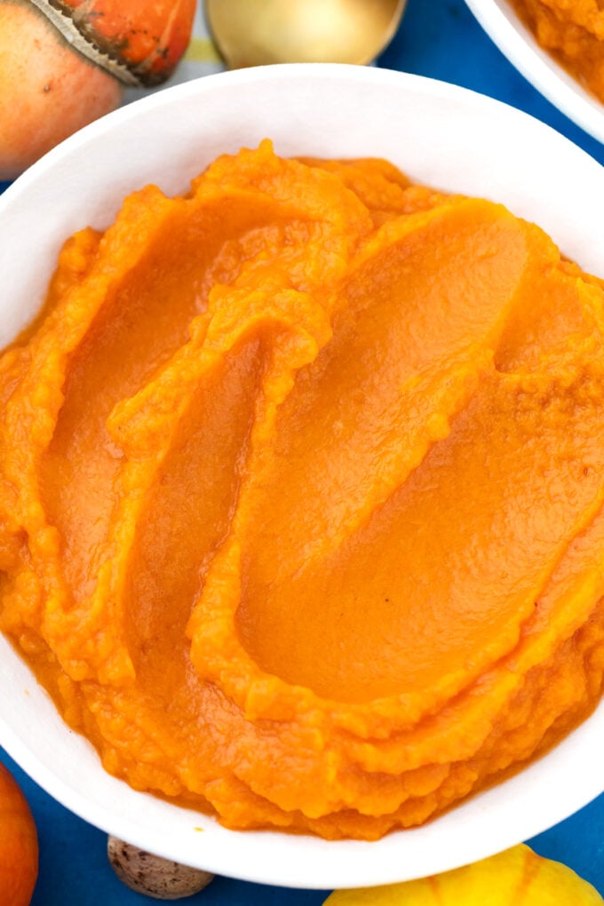 Overhead shot of homemade pumpkin puree in a bowl.