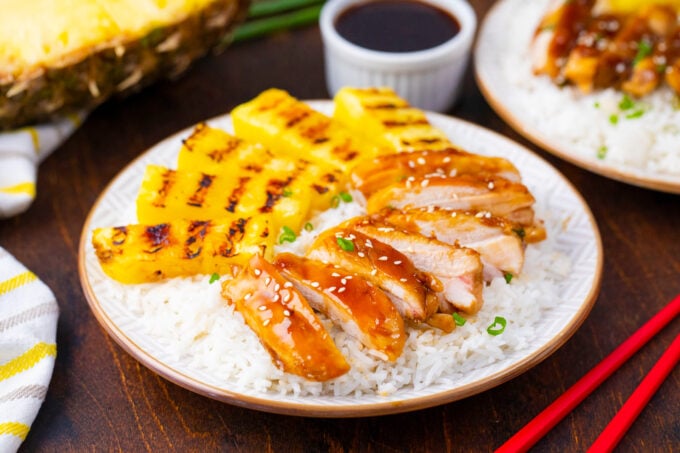 A plate of rice with homemade Panda Express mandarin teriyaki chicken.