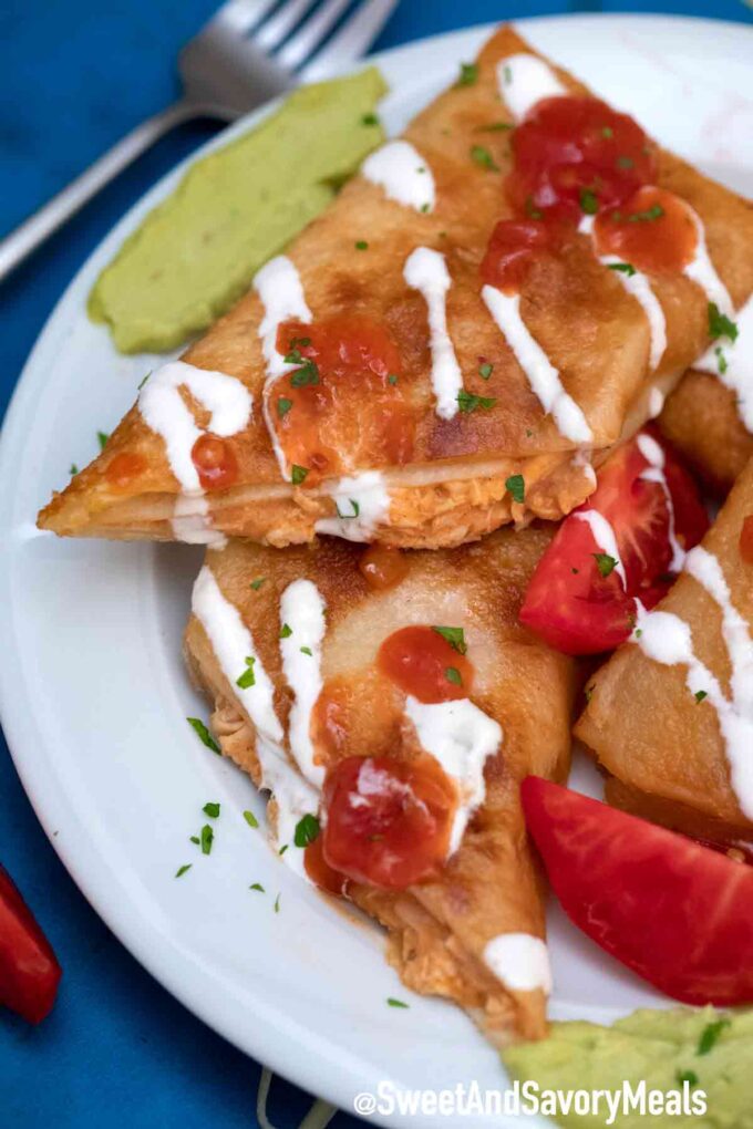 chicken chimichangas with guacamole and sour cream