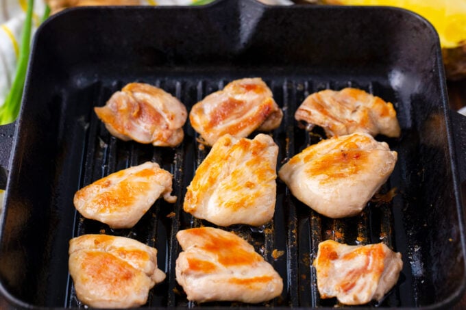 Grilling chicken in a grill pan.