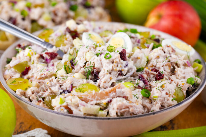 A spoonful of shredded turkey salad.