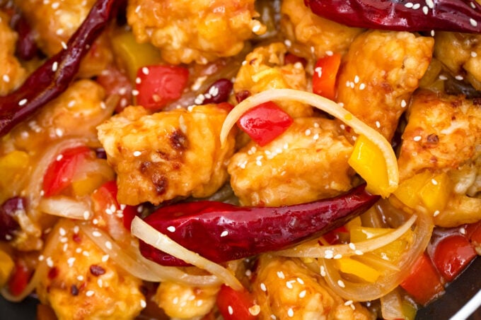 Spicy homemade Panda Express Firecracker Chicken with chili peppers.