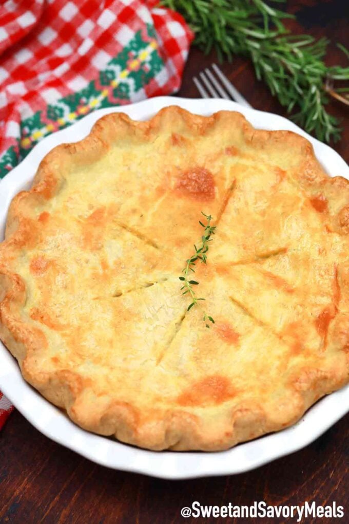 a whole turkey pot pie freshly baked out of the oven on a casserole dish