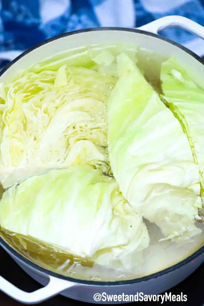 boiling cabbage wedges in a large pot